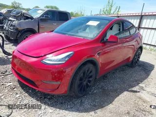 2020 Tesla Model Y Long Range z VIN 5YJYGDEE0LF034164, wystawiony jako IAAI lot #42080304 z przebiegiem 55 520 mil mil oraz . Historia ofert i sprzedaży dostępna na DreamBid. Obrazek 20.