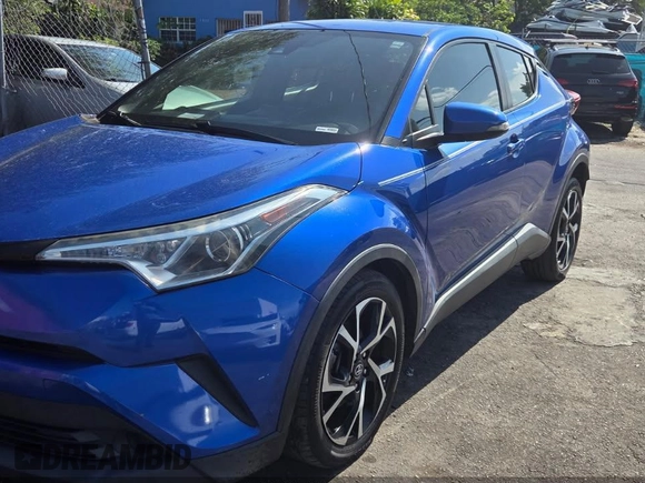 2018 Toyota C-HR XLE z VIN NMTKHMBX7JR014509, wystawiony jako IAAI lot #42375870 z przebiegiem 171 695 mil mil oraz . Historia ofert i sprzedaży dostępna na DreamBid. Obrazek 2.