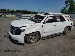 2019 Chevrolet Tahoe LT with VIN 1GNSKBKCXKR284815, listed as a Copart auction lot 57389515 with 161,799 mi miles and Salvage title. Bid and sale history available at DreamBid. Image 1.