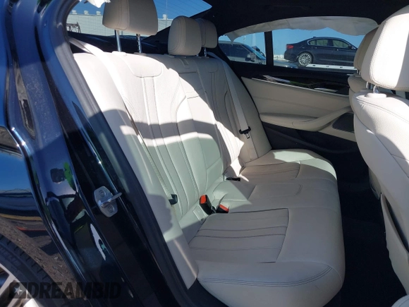2018 BMW 5 Series 530i with VIN WBAJA5C59JWA38170, listed as a IAAI auction lot 41682219 with 61,990 mi miles and . Bid and sale history available at DreamBid. Image 8.