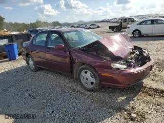 2001 Chevrolet Malibu LS with VIN 1G1NE52J016153947, listed as a Copart auction lot 73813784 with 129,336 mi miles and Salvage Title. Bid and sale history available at carsss.com. Image 4.