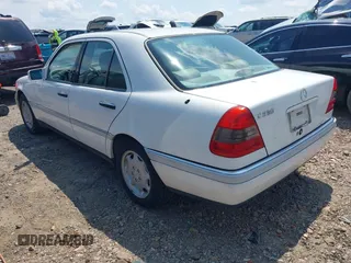 1997 Mercedes-Benz C with VIN WDBHA23E2VF504829, listed as a IAAI auction lot 42690662 with 266,074 mi miles and . Bid and sale history available at DreamBid. Image 3.