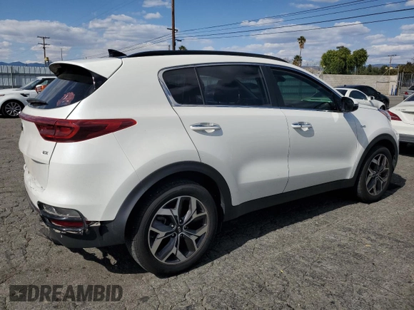 2020 Kia Sportage EX z VIN KNDPNCAC0L7805972, wystawiony jako Copart lot #52038825 z przebiegiem 65 794 mil mil oraz Szkoda całkowita • Salvage title. Historia ofert i sprzedaży dostępna na DreamBid. Obrazek 3.