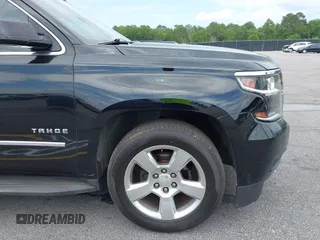 2015 Chevrolet Tahoe LT with VIN 1GNSCBKC4FR145119, listed as a IAAI auction lot 42309931 with 99,408 mi miles and . Bid and sale history available at DreamBid. Image 17.