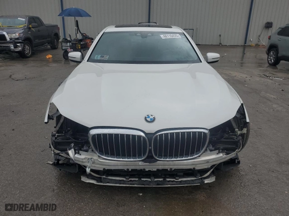 2017 BMW 7 Series 750i with VIN WBA7F0C34HGM21478, listed as a Copart auction lot 48116435 with 76,617 mi miles and Salvage Title. Bid and sale history available at carsss.com. Image 5.