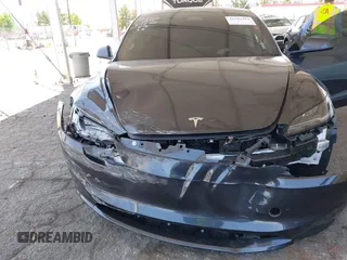2025 Tesla Model 3 Long Range with VIN 5YJ3E1EA5SF978214, listed as a IAAI auction lot 42525444 with 6,489 mi miles and . Bid and sale history available at DreamBid. Image 6.