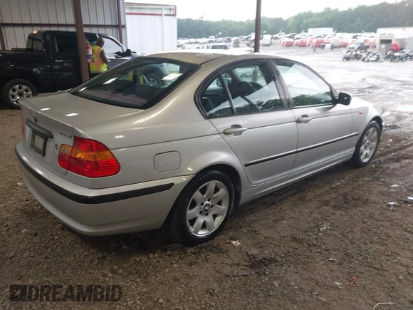 2005 BMW 3 Series 325i with VIN WBAEV33435KX12700, listed as a IAAI auction lot 42803872 with 111,410 mi miles and . Bid and sale history available at DreamBid. Image 4.