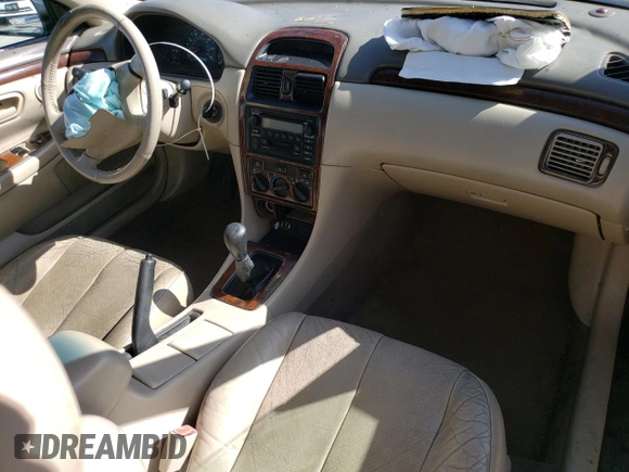 2000 Toyota Solara SE z VIN 2T1CF22P9YC364050, wystawiony jako Copart lot #56972195 z przebiegiem 178 229 mil mil oraz Szkoda całkowita • Salvage title. Historia ofert i sprzedaży dostępna na DreamBid. Obrazek 8.