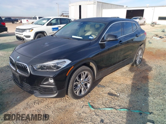 2020 BMW X2 xDrive28i with VIN WBXYJ1C02L5P31038, listed as a IAAI auction lot 41338219 with 72,854 mi miles. Bid and sale history available at carsss.com. Image 17.