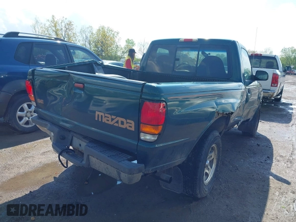 1998 Mazda B-Series Truck SX with VIN 4F4YR12C4WTM03287, listed as a IAAI auction lot 42182560 with 94,609 mi miles and . Bid and sale history available at DreamBid. Image 4.