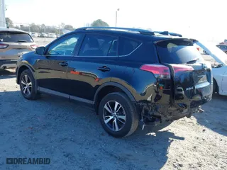 2018 Toyota RAV4 XLE with VIN 2T3RFREV9JW793956, listed as a IAAI auction lot 41012152 with 77,033 mi miles. Bid and sale history available at carsss.com. Image 3.