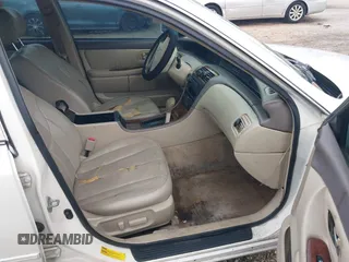 2001 Toyota Avalon XL z VIN 4T1BF28B01U114773, wystawiony jako IAAI lot #42506167 z przebiegiem 155 540 mil mil oraz . Historia ofert i sprzedaży dostępna na DreamBid. Obrazek 5.