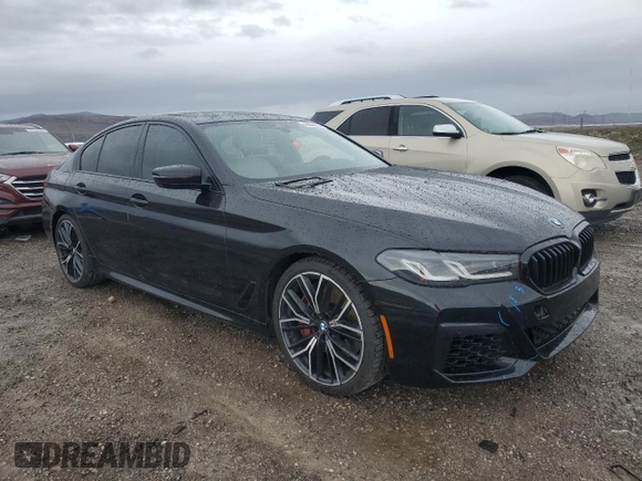 2022 BMW 5 Series M550i xDrive with VIN WBA13BK02NCH84353, listed as a Copart auction lot 46836204 with Not provided miles and Salvage title. Bid and sale history available at DreamBid. Image 4.