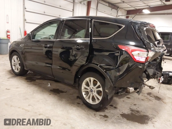 2017 Ford Escape SE with VIN 1FMCU9G94HUE08060, listed as a IAAI auction lot 41856229 with 187,838 mi miles and . Bid and sale history available at carsss.com. Image 3.
