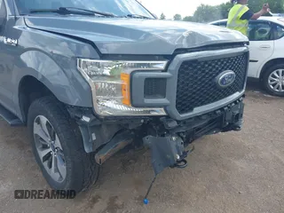 2020 Ford F-150 XL z VIN 1FTEX1EP0LKF35089, wystawiony jako IAAI lot #42657401 z przebiegiem 65 347 mil mil oraz . Historia ofert i sprzedaży dostępna na DreamBid. Obrazek 19.
