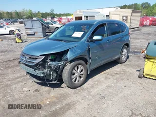 2014 Honda CR-V EX-L with VIN 2HKRM3H74EH533638, listed as a IAAI auction lot 41972083 with 165,663 mi miles and . Bid and sale history available at carsss.com. Image 2.