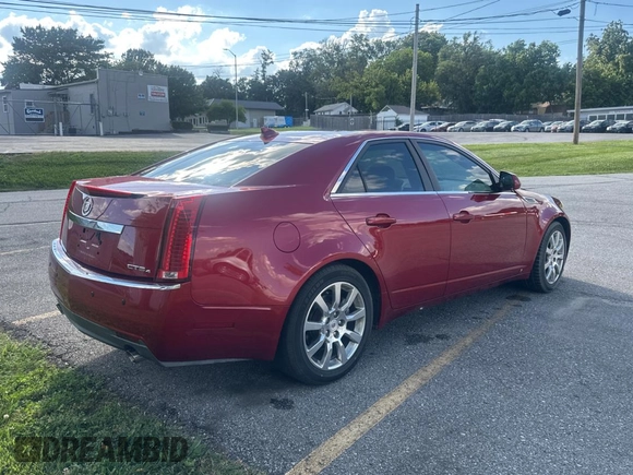 2009 Cadillac CTS AWD with VIN 1G6DG577X90136651, listed as a Copart auction lot 62787455 with 117,417 mi miles and Clean title. Bid and sale history available at DreamBid. Image 4.