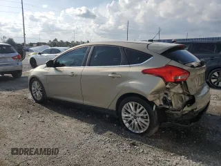 2016 Ford Focus Titanium with VIN 1FADP3N24GL302625, listed as a Copart auction lot 59180675 with 97,401 mi miles and Salvage title. Bid and sale history available at DreamBid. Image 2.