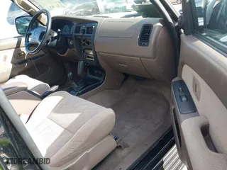 2000 Toyota 4Runner SR5 with VIN JT3HN86R1Y0322493, listed as a IAAI auction lot 41938857 with 121,124 mi miles. Bid and sale history available at carsss.com. Image 5.