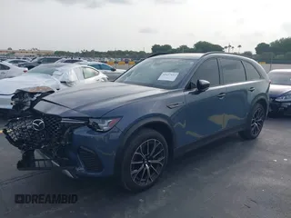 2025 Mazda CX-70 Premium Plus with VIN JM3KJEHA3S1126454, listed as a IAAI auction lot 42427454 with 5,648 mi miles and . Bid and sale history available at DreamBid. Image 2.