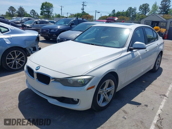 2013 BMW 3 Series 328i with VIN WBA3A5C55DF358287, listed as a IAAI auction lot 42027372 with 149,981 mi miles. Bid and sale history available at carsss.com. Image 2.