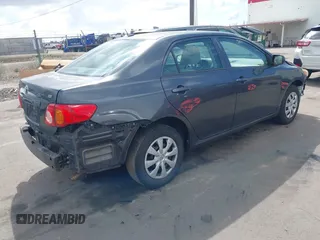 2010 Toyota Corolla with VIN 1NXBU4EE9AZ215505, listed as a IAAI auction lot 41957182 with 143,566 mi miles. Bid and sale history available at carsss.com. Image 4.