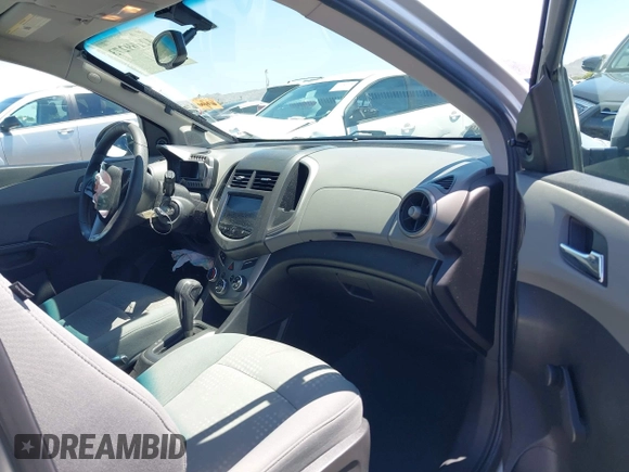 2014 Chevrolet Sonic LS with VIN 1G1JA6SH1E4135729, listed as a IAAI auction lot 42169273 with 74,969 mi miles and . Bid and sale history available at DreamBid. Image 5.