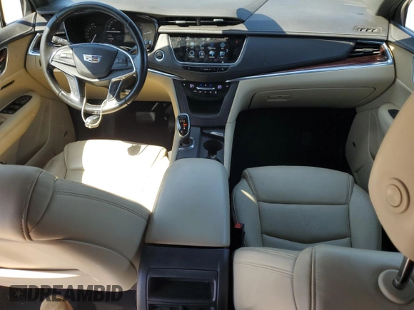 2019 Cadillac XT5 Luxury FWD with VIN 1GYKNCRS1KZ131818, listed as a Copart auction lot 49354595 with 131,995 mi miles and Salvage Title. Bid and sale history available at DreamBid. Image 8.