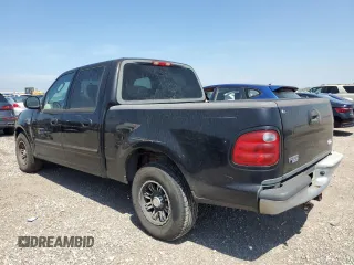 2003 Ford F-150 XLT with VIN 1FTRW07623KD82847, listed as a Copart auction lot 50303265 with 156,781 mi miles and Clean Title. Bid and sale history available at carsss.com. Image 2.