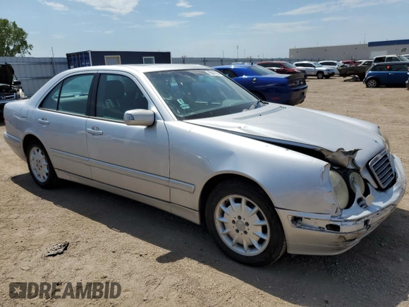 2002 Mercedes-Benz E-Class with VIN WDBJF82J92X065591, listed as a Copart auction lot 65841964 with 155,195 mi miles and Salvage Title. Bid and sale history available at carsss.com. Image 4.