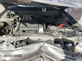 1994 Toyota Camry LE z VIN JT2GK12E2R0050878, wystawiony jako Copart lot #46878005 z przebiegiem 152 211 mil mil oraz Szkoda całkowita • Salvage title. Historia ofert i sprzedaży dostępna na DreamBid. Obrazek 12.
