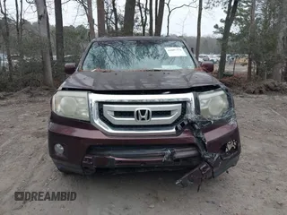 2010 Honda Pilot Touring with VIN 5FNYF4H9XAB040715, listed as a IAAI auction lot 41807334 with 262,786 mi miles and . Bid and sale history available at carsss.com. Image 13.