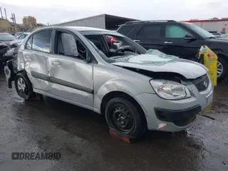 2008 Kia Rio LX with VIN KNADE123886430820, listed as a IAAI auction lot 41480608 with 80,960 mi miles. Bid and sale history available at carsss.com. Image 1.