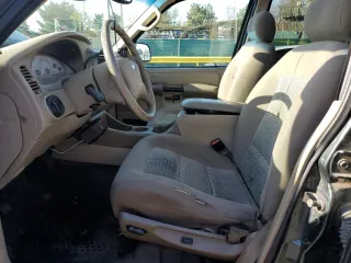 2004 Ford Explorer Sport Trac XLS z VIN 1FMDU77K04UB85358, wystawiony jako Copart lot #55636625 z przebiegiem 155 953 mil mil oraz Szkoda całkowita • Salvage title. Historia ofert i sprzedaży dostępna na DreamBid. Obrazek 7.