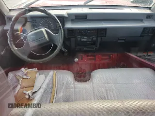 1991 Mitsubishi Mighty Max z VIN JA7FL24W3MP017705, wystawiony jako Copart lot #85737304 z przebiegiem 261 896 mil mil oraz Szkody całkowita. Historia ofert i sprzedaży dostępna na DreamBid. Obrazek 8.