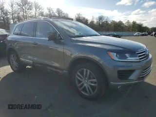 2015 Volkswagen Touareg Sport with VIN WVGEF9BP9FD007657, listed as a Copart auction lot 49432045 with 61,668 mi miles and Salvage title. Bid and sale history available at DreamBid. Image 4.