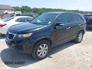 2013 Kia Sorento LX with VIN 5XYKT3A19DG381288, listed as a IAAI auction lot 42797647 with 220,000 mi miles and . Bid and sale history available at DreamBid. Image 2.