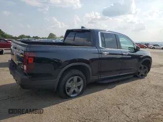 2022 Honda Ridgeline RTL-E with VIN 5FPYK3F7XNB023787, listed as a Copart auction lot 66883515 with 49,786 mi miles and Salvage title. Bid and sale history available at DreamBid. Image 3.
