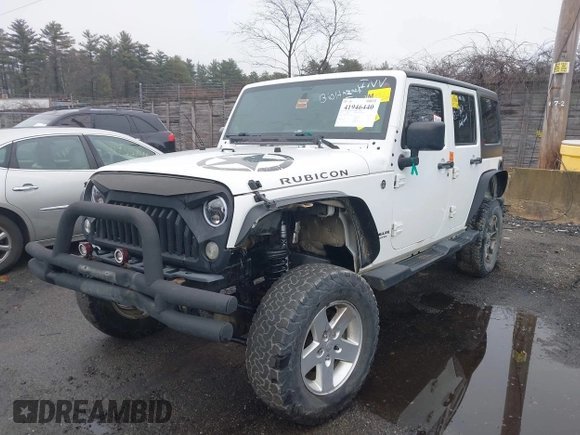 2014 Jeep Wrangler Unlimited Rubicon with VIN 1C4BJWFG9EL274851, listed as a IAAI auction lot 41946440 with 1 mi miles. Bid and sale history available at carsss.com. Image 2.