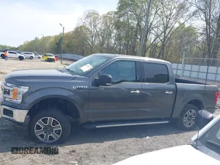 2018 Ford F-150 XL with VIN 1FTEW1CP2JFB50015, listed as a IAAI auction lot 41938177 with 248,137 mi miles and . Bid and sale history available at DreamBid. Image 14.