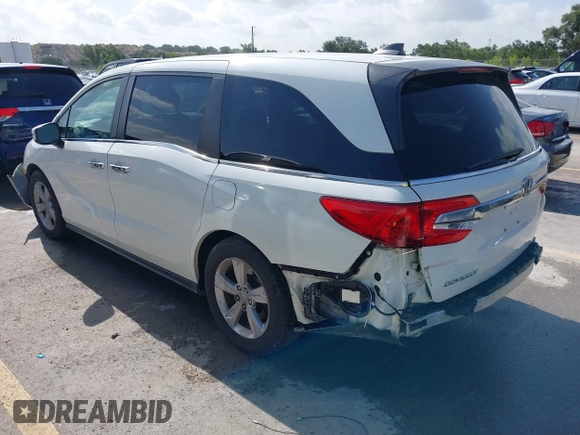 2018 Honda Odyssey EX with VIN 5FNRL6H57JB100035, listed as a IAAI auction lot 42582758 with 88,585 mi miles and . Bid and sale history available at DreamBid. Image 3.