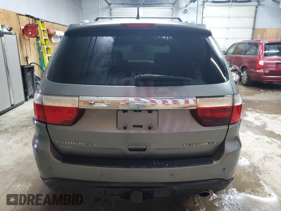 2013 Dodge Durango Citadel z VIN 1C4RDJEG3DC589718, wystawiony jako Copart lot #78850004 z przebiegiem 215 349 mil mil oraz Szkoda całkowita • Salvage title. Historia ofert i sprzedaży dostępna na DreamBid. Obrazek 6.