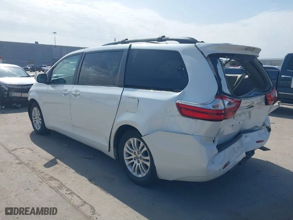 2015 Toyota Sienna XLE with VIN 5TDYK3DC0FS537542, listed as a IAAI auction lot 41578232 with 125,007 mi miles. Bid and sale history available at carsss.com. Image 3.