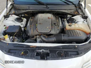 2015 Chrysler 300 C with VIN 2C3CCAET3FH830414, listed as a Copart auction lot 73649014 with Not Provided miles and Salvage Title. Bid and sale history available at DreamBid. Image 11.