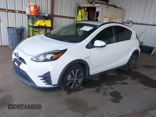 2018 Toyota Prius One with VIN JTDKDTB31J1599993, listed as a IAAI auction lot 42054102 with 107,472 mi miles and . Bid and sale history available at DreamBid. Image 2.
