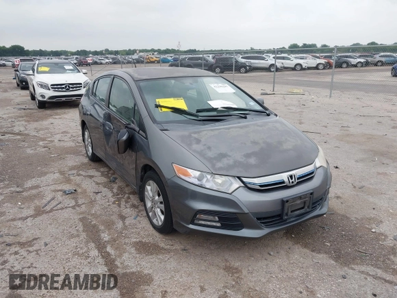 2012 Honda Insight EX with VIN JHMZE2H79CS004299, listed as a IAAI auction lot 42296207 with 170,288 mi miles and . Bid and sale history available at DreamBid. Image 1.