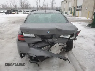 2021 BMW 5 Series M550i xDrive z VIN WBA13BK05MCF97316, wystawiony jako Copart lot #63713144 z przebiegiem Nie podano mil oraz Szkoda całkowita • Salvage title. Historia ofert i sprzedaży dostępna na DreamBid. Obrazek 6.
