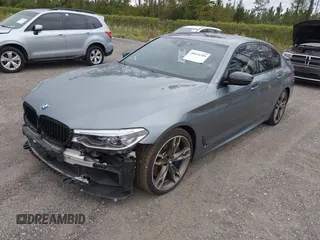 2019 BMW 5 Series M550i xDrive with VIN WBAJB9C57KB289439, listed as a IAAI auction lot 40634389 with 85,992 mi miles and . Bid and sale history available at DreamBid. Image 2.