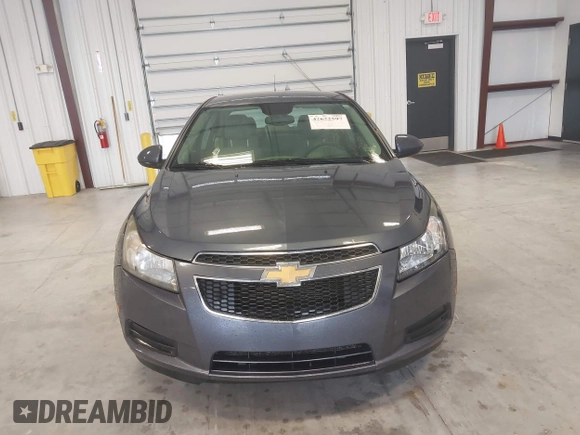 2014 Chevrolet Cruze 1LT z VIN 1G1PC5SB4E7140559, wystawiony jako IAAI lot #42622597 z przebiegiem 127 756 mil mil oraz . Historia ofert i sprzedaży dostępna na DreamBid. Obrazek 12.