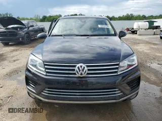 2016 Volkswagen Touareg Sport z VIN WVGEF9BP3GD008823, wystawiony jako Copart lot #56838985 z przebiegiem 49 612 mil mil oraz Nie do naprawy • Non repairable. Historia ofert i sprzedaży dostępna na DreamBid. Obrazek 5.